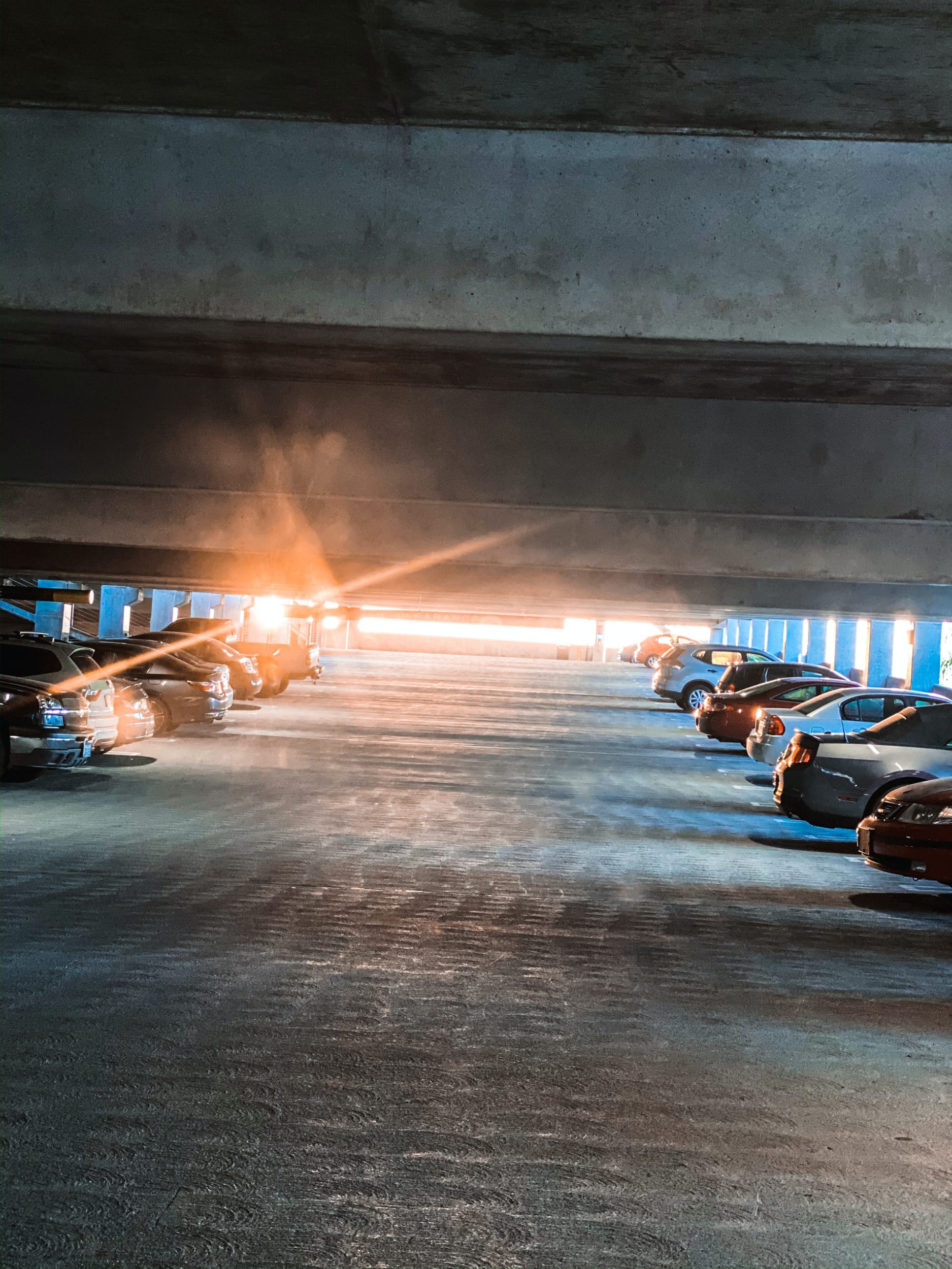 a group of people under a bridge at night