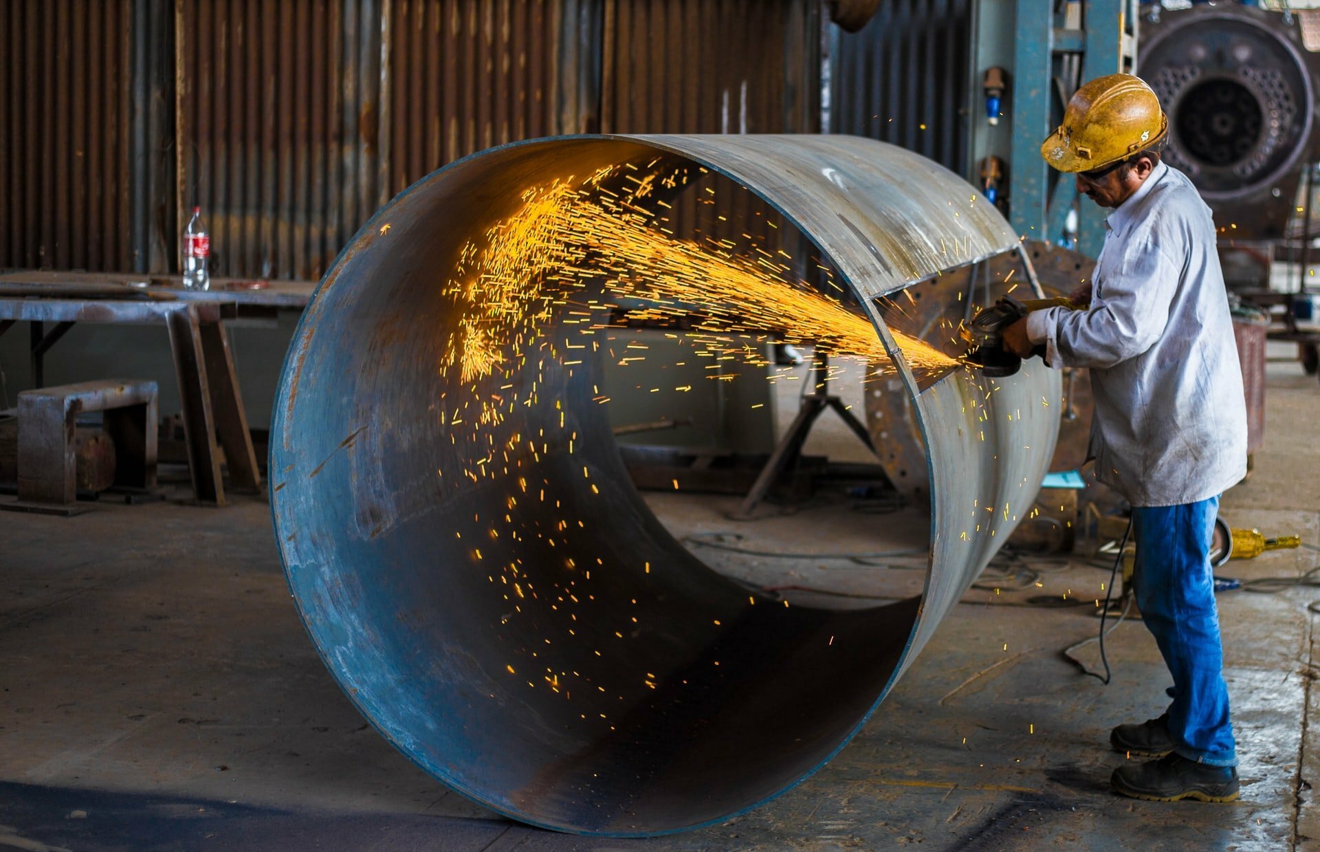 a person working on a large round object