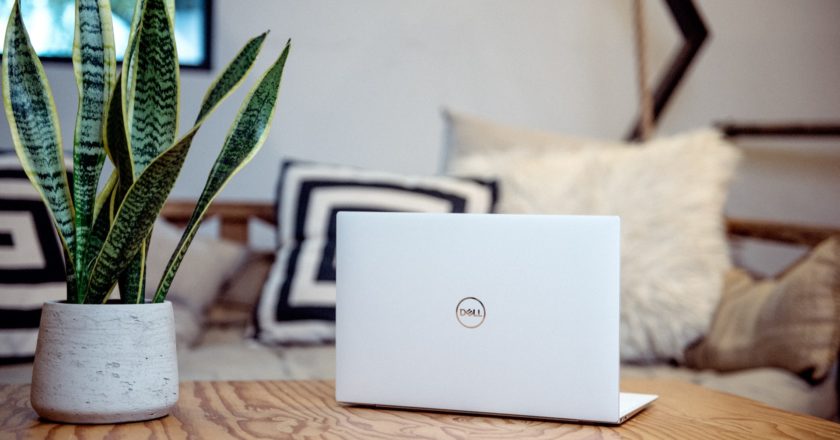 a white laptop on a table